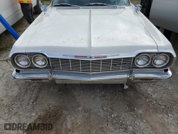 1964 Chevrolet Impala z VIN 41847J219664, wystawiony jako Copart lot #75891214 z przebiegiem 47 312 mil mil oraz Szkoda całkowita • Salvage title. Historia ofert i sprzedaży dostępna na DreamBid. Obrazek 11.