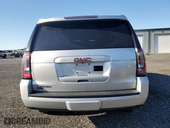 2015 GMC Yukon SLT z VIN 1GKS1BKC7FR527678, wystawiony jako Copart lot #53356615 z przebiegiem 110 125 mil mil oraz Szkoda całkowita • Salvage title. Historia ofert i sprzedaży dostępna na DreamBid. Obrazek 6.