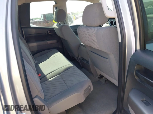 2011 Toyota Tundra with VIN 5TFRM5F18BX033833, listed as a IAAI auction lot 42257200 with 108,046 mi miles and . Bid and sale history available at DreamBid. Image 8.