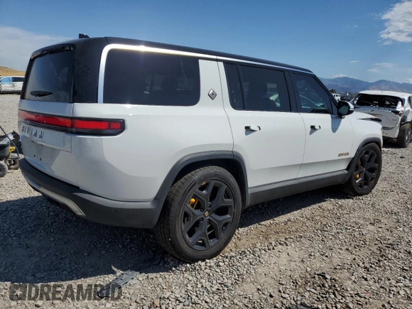 2023 Rivian R1S Launch Edition z VIN 7PDSGABLXPN004161, wystawiony jako Copart lot #67390954 z przebiegiem Nie podano mil oraz Szkody całkowita. Historia ofert i sprzedaży dostępna na DreamBid. Obrazek 3.