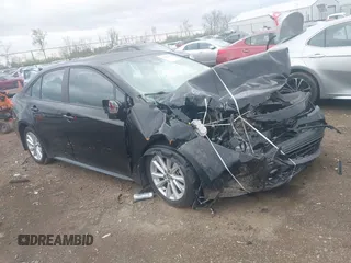 2023 Toyota Corolla LE with VIN 5YFB4MDE1PP058774, listed as a IAAI auction lot 42068978 with 19,802 mi miles and . Bid and sale history available at DreamBid. Image 1.