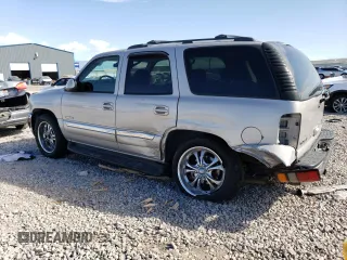 2004 GMC Yukon SLT with VIN 1GKEK13Z04J140148, listed as a Copart auction lot 52411494 with 167,629 mi miles and Salvage Title. Bid and sale history available at carsss.com. Image 2.