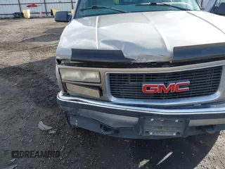 1999 GMC Yukon with VIN 1GKEK13R2XJ712390, listed as a IAAI auction lot 41793649 with 222,721 mi miles. Bid and sale history available at carsss.com. Image 6.