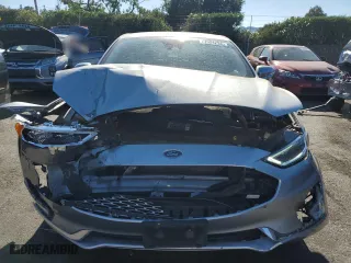 2020 Ford Fusion Plug-In Hybrid Titanium with VIN 3FA6P0SUXLR258459, listed as a Copart auction lot 71624294 with 116,228 mi miles and Salvage Title. Bid and sale history available at carsss.com. Image 5.