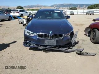 2016 BMW 4 Series 428i xDrive z VIN WBA4C9C55GG140032, wystawiony jako Copart lot #57702215 z przebiegiem 57 050 mil mil oraz Szkoda całkowita • Salvage title. Historia ofert i sprzedaży dostępna na DreamBid. Obrazek 5.