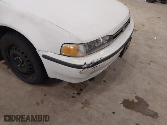 1993 Honda Accord z VIN 1HGCB7651PA022436, wystawiony jako IAAI lot #41785092 z przebiegiem Nie podano mil oraz . Historia ofert i sprzedaży dostępna na DreamBid. Obrazek 17.