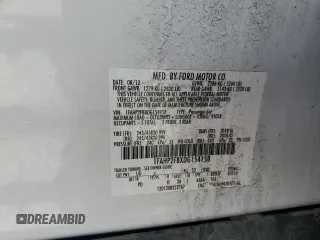 2013 Ford Taurus Limited with VIN 1FAHP2F8XDG154158, listed as a Copart auction lot 52065505 with 148,451 mi miles and Salvage Title. Bid and sale history available at DreamBid. Image 14.