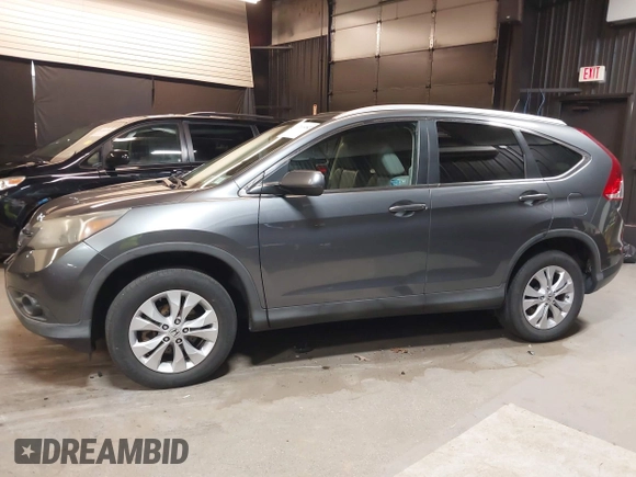 2012 Honda CR-V EX-L with VIN 2HKRM4H75CH619513, listed as a IAAI auction lot 42614822 with 116,903 mi miles and . Bid and sale history available at DreamBid. Image 14.