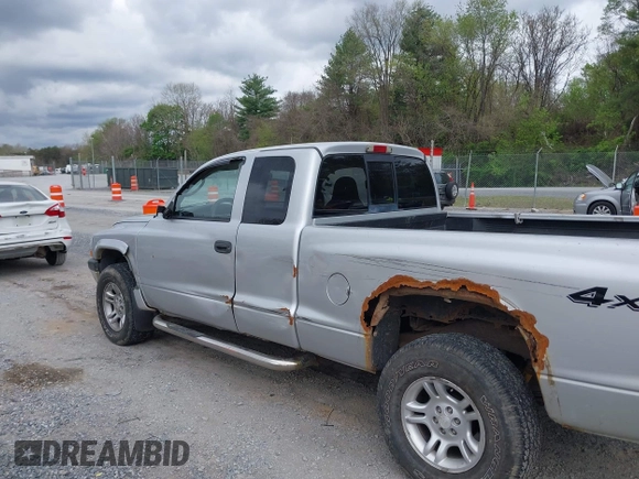 2003 Dodge Dakota Sport with VIN 1D7HG32N13S132871, listed as a IAAI auction lot 42059965 with 125,408 mi miles and . Bid and sale history available at carsss.com. Image 6.