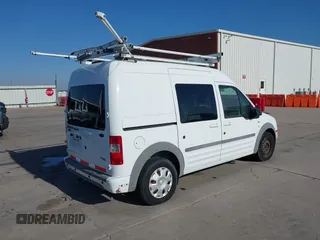 2012 Ford Transit Connect XLT with VIN NM0KS9BN8CT099523, listed as a IAAI auction lot 41473012 with Not provided miles and . Bid and sale history available at DreamBid. Image 4.