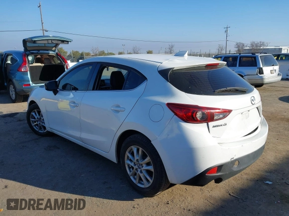 2014 Mazda 3 i Grand Touring with VIN JM1BM1M7XE1102093, listed as a IAAI auction lot 41344433 with 148,395 mi miles and . Bid and sale history available at DreamBid. Image 6.