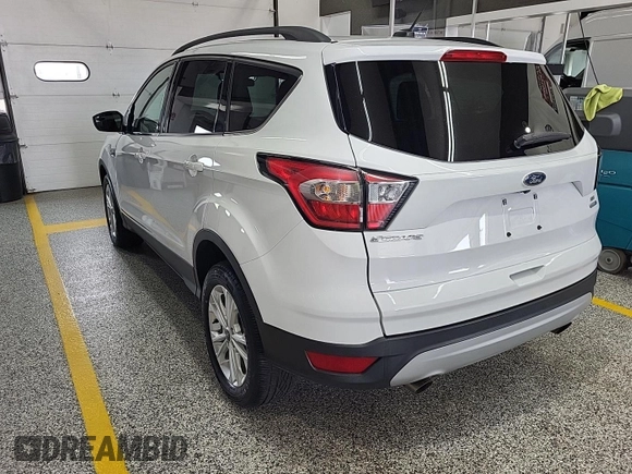 2018 Ford Escape SE z VIN 1FMCU9GD3JUC89119, wystawiony jako IAAI lot #42421139 z przebiegiem 42 209 mil mil oraz . Historia ofert i sprzedaży dostępna na DreamBid. Obrazek 13.