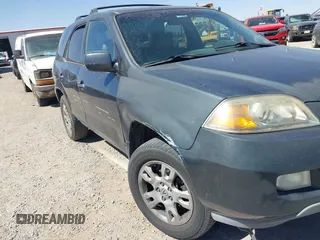 2006 Acura MDX Touring w/Navi with VIN 2HNYD18876H523408, listed as a IAAI auction lot 41756670 with 219,796 mi miles. Bid and sale history available at carsss.com. Image 6.
