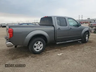 2008 Nissan Frontier LE with VIN 1N6AD09W28C407454, listed as a Copart auction lot 58741015 with 74,548 mi miles and Salvage title. Bid and sale history available at DreamBid. Image 3.