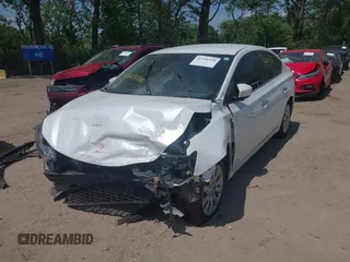 2017 Nissan Sentra SV with VIN 3N1AB7AP3HY268712, listed as a IAAI auction lot 42291330 with 99,975 mi miles and . Bid and sale history available at DreamBid. Image 2.