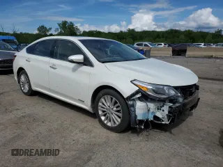 2014 Toyota Avalon Limited z VIN 4T1BD1EB9EU032227, wystawiony jako Copart lot #57016995 z przebiegiem 210 611 mil mil oraz Szkoda całkowita • Salvage title. Historia ofert i sprzedaży dostępna na DreamBid. Obrazek 4.