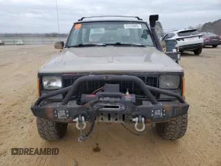 1993 Jeep Cherokee Sport with VIN 1J4FJ67S6PL580133, listed as a Copart auction lot 43230005 with 122,173 mi miles and Salvage Title. Bid and sale history available at carsss.com. Image 5.
