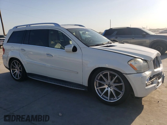 2010 Mercedes-Benz GL-Class GL 450 with VIN 4JGBF7BE8AA595373, listed as a Copart auction lot 73852304 with 211,033 mi miles and Salvage Title. Bid and sale history available at carsss.com. Image 4.