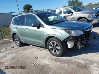 2017 Subaru Forester Premium with VIN JF2SJAEC9HH475837, listed as a IAAI auction lot 41408819 with 107,736 mi miles. Bid and sale history available at carsss.com. Image 1.