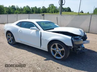 2014 Chevrolet Camaro LT z VIN 2G1FC1E38E9309361, wystawiony jako IAAI lot #42264715 z przebiegiem 143 656 mil mil oraz . Historia ofert i sprzedaży dostępna na DreamBid. Obrazek 1.