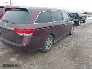 2015 Honda Odyssey EX-L with VIN 5FNRL5H68FB030104, listed as a IAAI auction lot 41684307 with 182,185 mi miles. Bid and sale history available at carsss.com. Image 4.