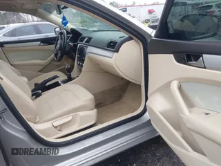 2012 Volkswagen Passat SE with VIN 1VWBH7A36CC077412, listed as a IAAI auction lot 41651796 with 113,259 mi miles and . Bid and sale history available at DreamBid. Image 5.