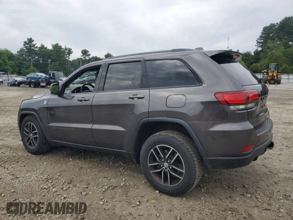 2018 Jeep Grand Cherokee Trailhawk with VIN 1C4RJFLG1JC264781, listed as a Copart auction lot 61524135 with 82,786 mi miles and Salvage title. Bid and sale history available at DreamBid. Image 2.
