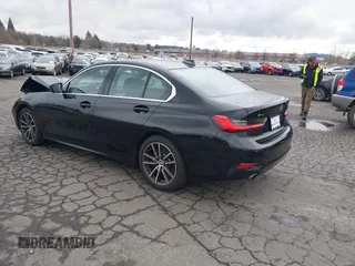2021 BMW 3 Series 330i xDrive with VIN 3MW5R7J08M8C16500, listed as a IAAI auction lot 41469052 with 21,660 mi miles. Bid and sale history available at carsss.com. Image 3.