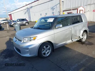 2015 Scion xB with VIN JTLZE4FE7FJ073828, listed as a IAAI auction lot 41857967 with 56,242 mi miles. Bid and sale history available at carsss.com. Image 17.