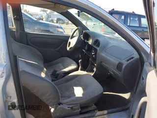 1999 Suzuki Swift z VIN 2S2AB21H9X6600313, wystawiony jako IAAI lot #41430319 z przebiegiem 149 795 mil mil oraz . Historia ofert i sprzedaży dostępna na DreamBid. Obrazek 5.