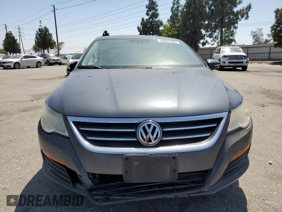 2012 Volkswagen CC R-Line z VIN WVWMP7AN5CE534912, wystawiony jako Copart lot #58267995 z przebiegiem 124 995 mil mil oraz Szkoda całkowita • Salvage title. Historia ofert i sprzedaży dostępna na DreamBid. Obrazek 5.