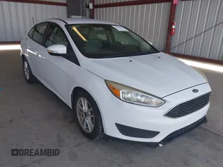 2016 Ford Focus SE z VIN 1FADP3F23GL272046, wystawiony jako IAAI lot #42401449 z przebiegiem 150 567 mil mil oraz . Historia ofert i sprzedaży dostępna na DreamBid. Obrazek 1.