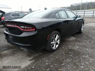2022 Dodge Charger SXT with VIN 2C3CDXJG3NH206345, listed as a IAAI auction lot 40844458 with 49,387 mi miles. Bid and sale history available at carsss.com. Image 4.