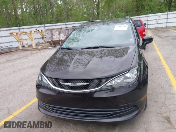 2017 Chrysler Pacifica Touring with VIN 2C4RC1DG9HR620973, listed as a IAAI auction lot 42250448 with 108,863 mi miles and . Bid and sale history available at DreamBid. Image 12.