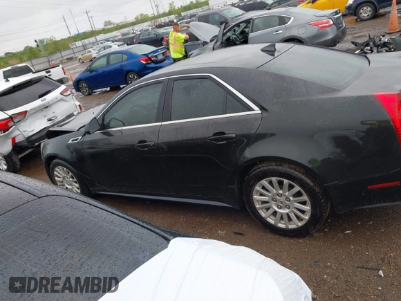 2013 Cadillac CTS Luxury z VIN 1G6DG5E52D0111849, wystawiony jako IAAI lot #42130235 z przebiegiem 129 993 mil mil oraz . Historia ofert i sprzedaży dostępna na DreamBid. Obrazek 14.