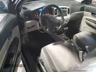 2010 Hyundai Accent SE with VIN KMHCN3AC8AU181637, listed as a Copart auction lot 63095135 with 195,945 mi miles and Salvage title. Bid and sale history available at DreamBid. Image 8.