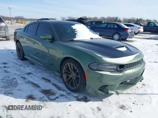 2021 Dodge Charger Scat Pack with VIN 2C3CDXGJXMH576323, listed as a IAAI auction lot 41607742 with 31,680 mi miles and . Bid and sale history available at DreamBid. Image 1.