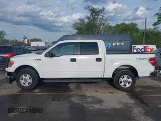 2014 Ford F-150 XL with VIN 1FTFW1EFXEKE92754, listed as a IAAI auction lot 42109551 with 219,130 mi miles. Bid and sale history available at carsss.com. Image 15.