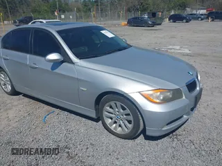 2007 BMW 3 Series 328i with VIN WBAVA33597PV64448, listed as a IAAI auction lot 41874952 with 203,284 mi miles. Bid and sale history available at carsss.com. Image 1.