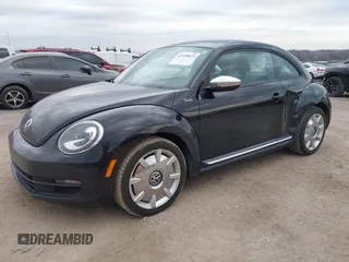 2013 Volkswagen Beetle 2.5L with VIN 3VWJP7AT8DM679548, listed as a IAAI auction lot 41459613 with 135,198 mi miles and . Bid and sale history available at DreamBid. Image 17.