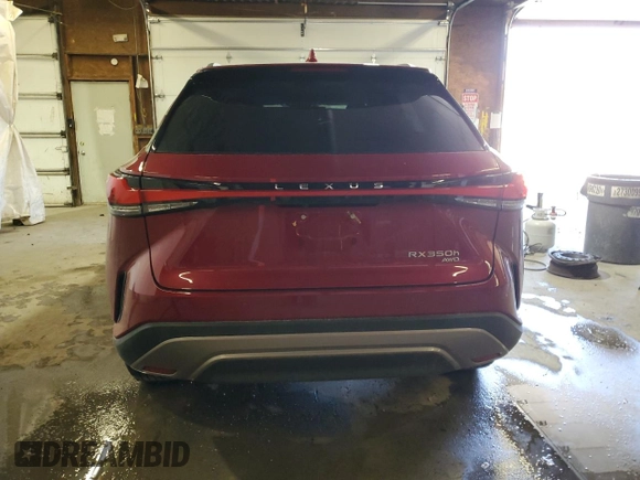 2023 Lexus RX 350h with VIN 2T2BBMCA5PC013398, listed as a Copart auction lot 50963615 with 13,587 mi miles and Salvage Title. Bid and sale history available at DreamBid. Image 6.
