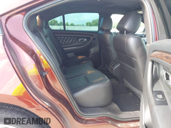 2015 Ford Taurus Limited with VIN 1FAHP2F85FG165586, listed as a IAAI auction lot 42565514 with 183,365 mi miles and . Bid and sale history available at DreamBid. Image 8.