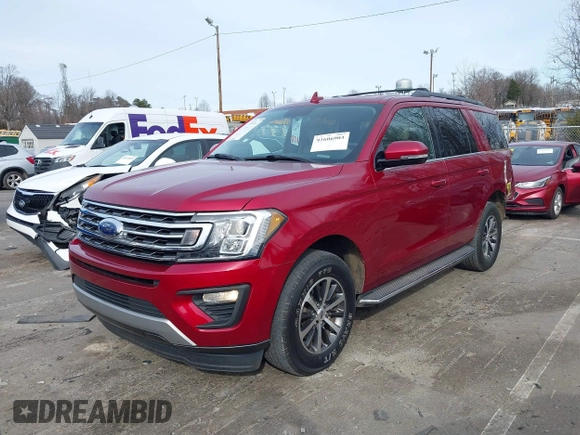 2018 Ford Expedition XLT with VIN 1FMJU1HT6JEA71703, listed as a IAAI auction lot 41606903 with 87,151 mi miles. Bid and sale history available at carsss.com. Image 2.