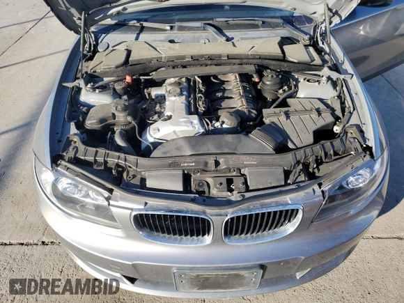 2011 BMW 1 Series 128i z VIN WBAUP9C59BVL90236, wystawiony jako Copart lot #89027105 z przebiegiem 169 716 mil mil oraz Tytuł czysty. Historia ofert i sprzedaży dostępna na DreamBid. Obrazek 11.