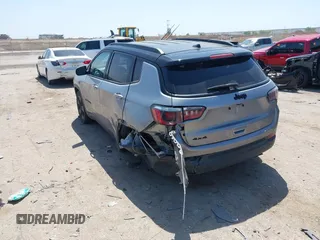 2018 Jeep Compass Latitude with VIN 3C4NJDBB3JT304145, listed as a IAAI auction lot 42008241 with 52,642 mi miles and . Bid and sale history available at DreamBid. Image 3.