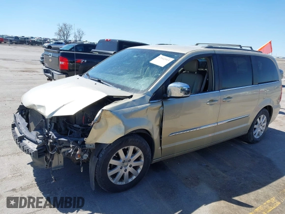 2011 Chrysler Town & Country Touring L with VIN 2A4RR8DG6BR781922, listed as a IAAI auction lot 42042313 with 155,612 mi miles and . Bid and sale history available at carsss.com. Image 2.