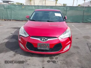 2013 Hyundai Veloster w/Black Int with VIN KMHTC6AD7DU117562, listed as a IAAI auction lot 41993745 with 106,780 mi miles. Bid and sale history available at carsss.com. Image 12.