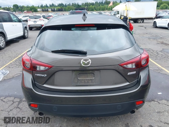 2014 Mazda 3 S Grand Touring with VIN JM1BM1M3XE1164610, listed as a IAAI auction lot 42421946 with 96,591 mi miles and . Bid and sale history available at DreamBid. Image 16.