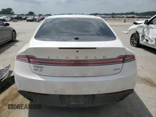 2014 Lincoln MKZ Hybrid z VIN 3LN6L2LU2ER816576, wystawiony jako Copart lot #57030235 z przebiegiem 221 863 mil mil oraz Szkoda całkowita • Salvage title. Historia ofert i sprzedaży dostępna na DreamBid. Obrazek 6.