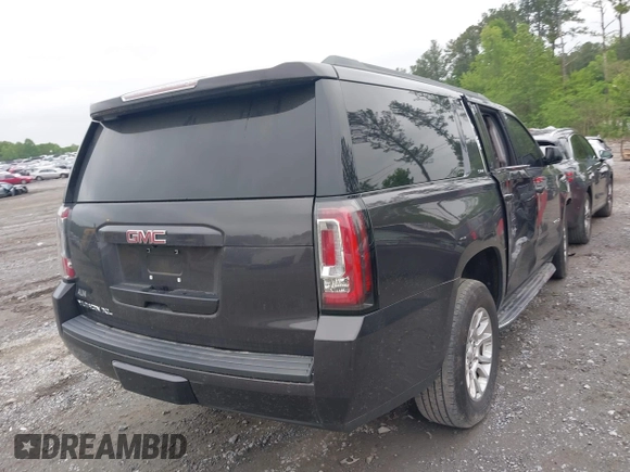 2015 GMC Yukon XL SLE z VIN 1GKS1GKC8FR507436, wystawiony jako IAAI lot #42113696 z przebiegiem Nie podano mil oraz . Historia ofert i sprzedaży dostępna na DreamBid. Obrazek 4.